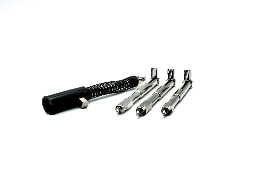 Best Glock Trigger Upgrades showing polished striker and springs on white background