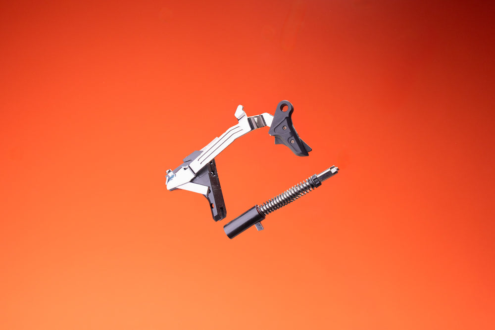 VEX 6 drop-in trigger kit with striker on red background landscape